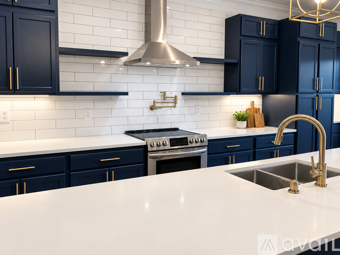 A kitchen with dark blue cabinets and a white countertop.