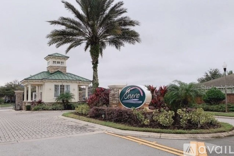 A sign for a place called Seterra is in front of a building with a green roof.