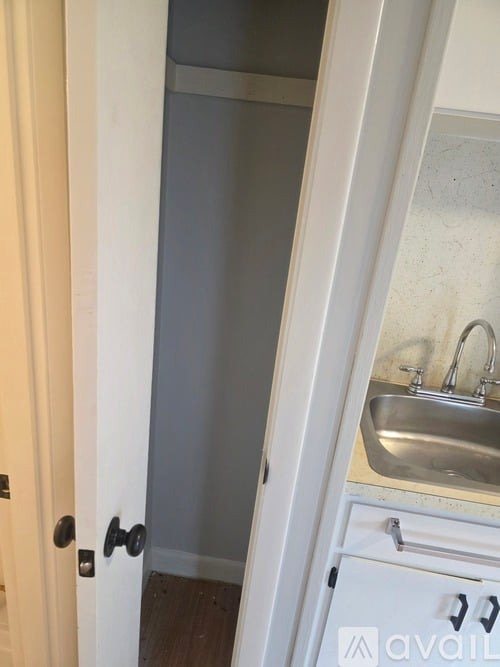 A bathroom with a sink and a toilet.