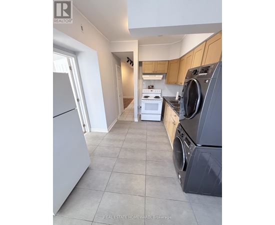 A laundry room with a washer and dryer.