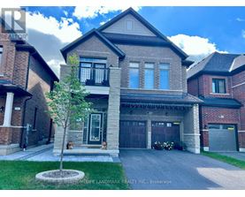 A large house with a garage is for sale.