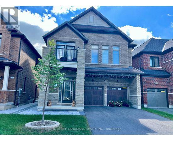 A large house with a garage is for sale.