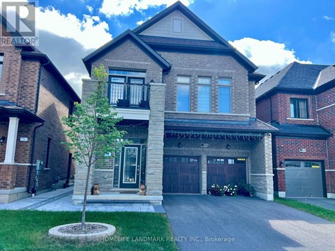 A large house with a garage is for sale.