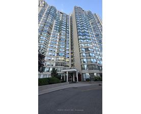 A tall building with many windows is shown in the image.