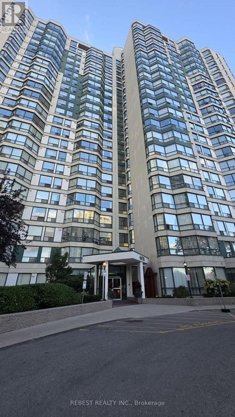 A tall building with many windows is shown in the image.