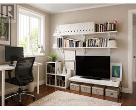 A white room with a desk, chair, and bookshelf.