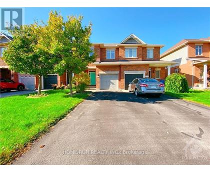 A residential street with a house and a parked car.