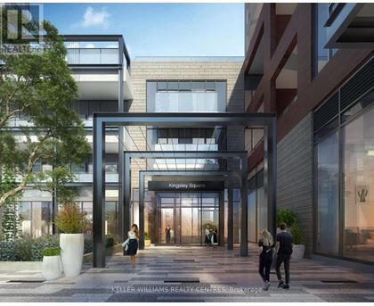 A modern building entrance with people walking in and out.