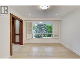 A room with a window and a door in it.