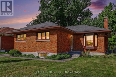 A house with a brick facade is for sale through Lotful Realty Brokerage.