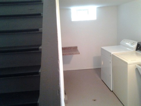 A laundry room with a washer and dryer.