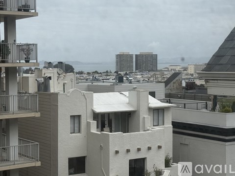 A view of a cityscape from a high-rise building.