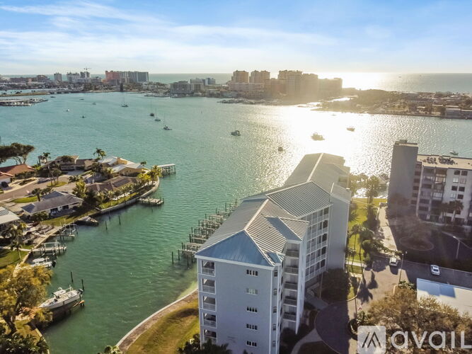 A view of a city with a body of water and buildings.