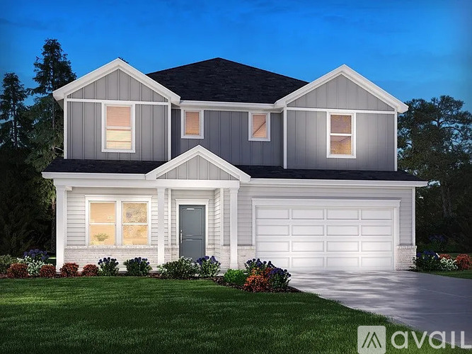 A house with a garage is available for sale.