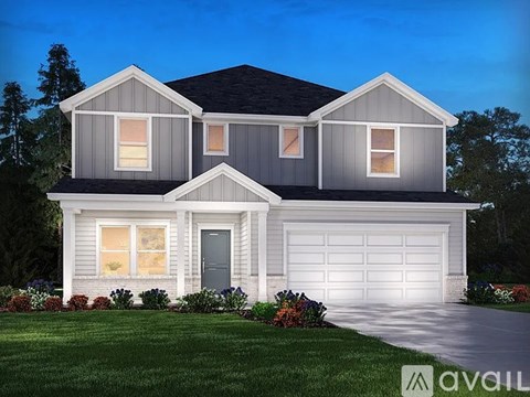 A house with a garage is available for sale.