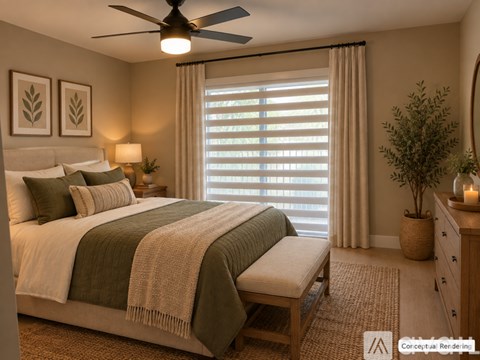A bedroom with a large bed and a ceiling fan.