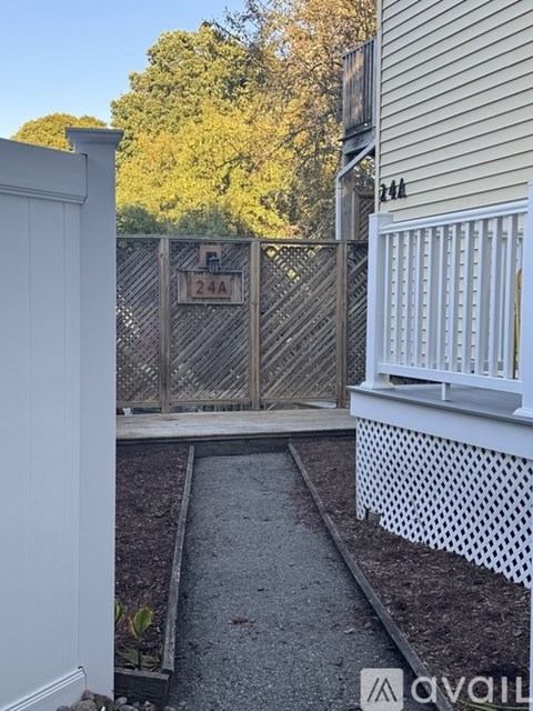 A gate with the number 24A on it is closed.