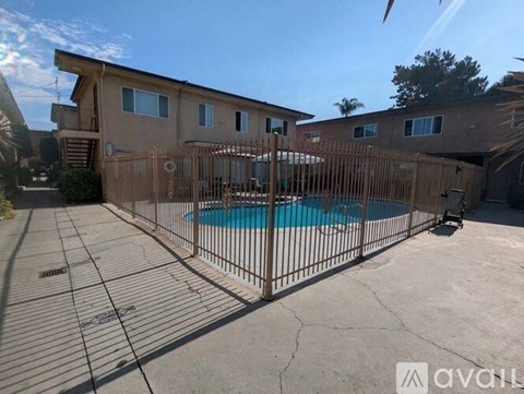 A house with a pool in the backyard.