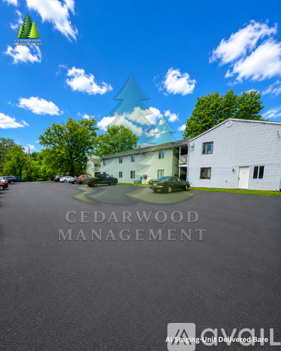 A large white building with the words Cedarwood Management written on it.
