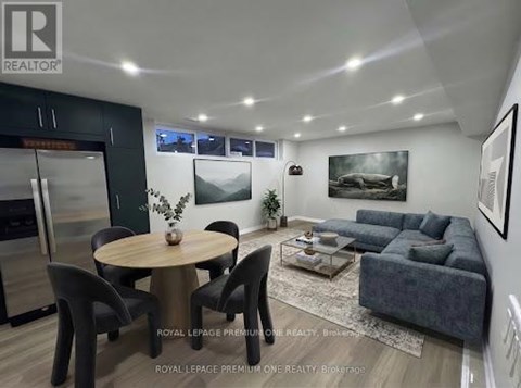 A modern living room with a dining table and chairs.