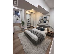 A bedroom with a large bed and a plant.