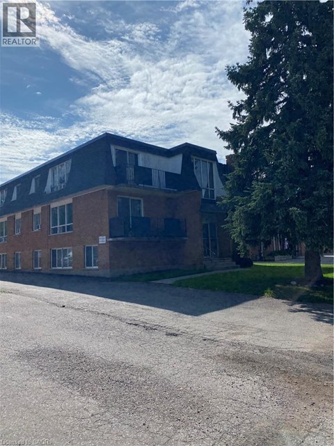 A building with a sign that says "REALTOR" on it.