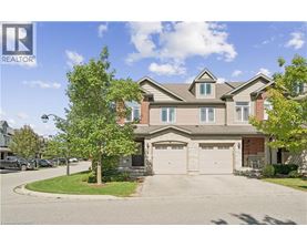A large house with a garage is for sale.