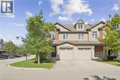 A large house with a garage is for sale.