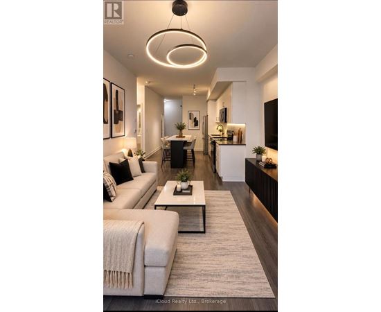 A modern living room with a white sofa and a coffee table.