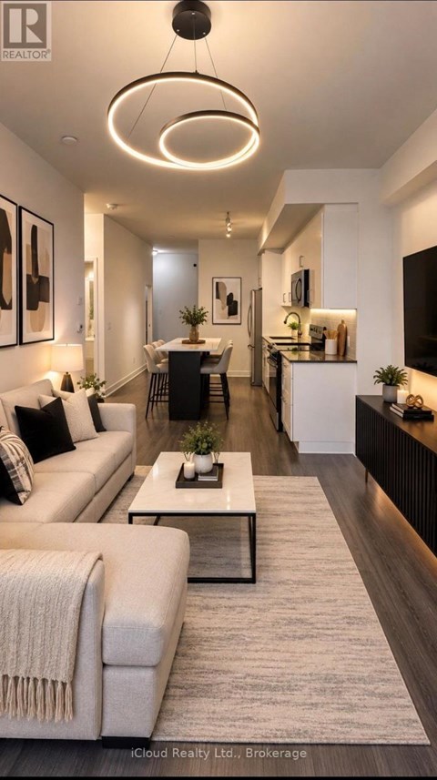 A modern living room with a white sofa and a coffee table.