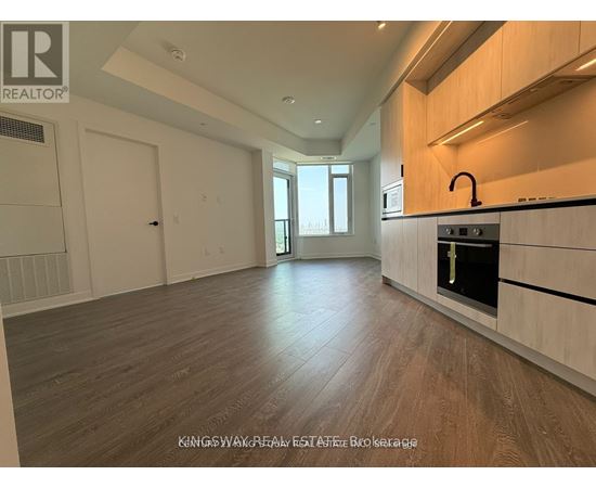 A kitchen with a stove top oven and a counter top.