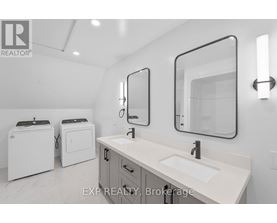 A bathroom with a sink, mirror, and toiletries.