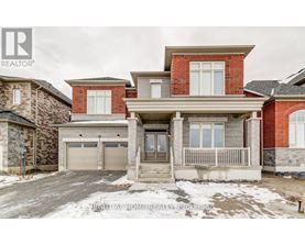 A large house with a garage is for sale.