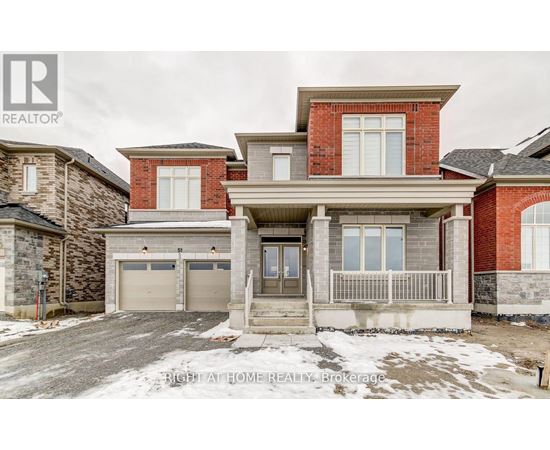 A large house with a garage is for sale.