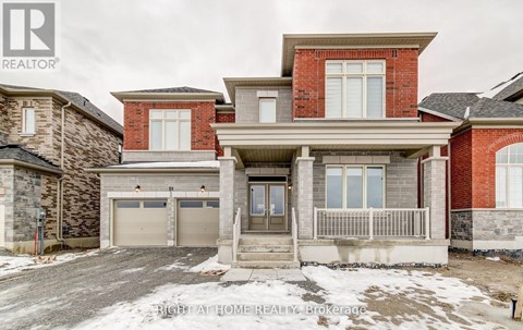 A large house with a garage is for sale.