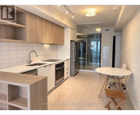 A kitchen with wooden cabinets and a white countertop.