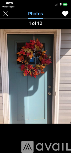 A door with a wreath on it.