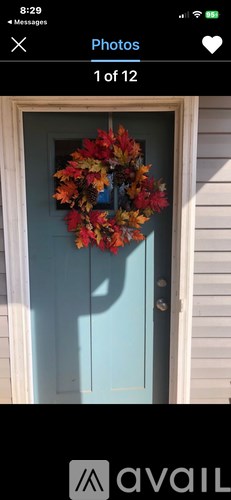 A door with a wreath on it.