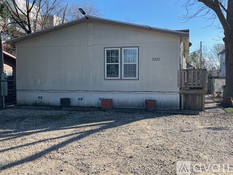 A small house with the number 3322 on it.