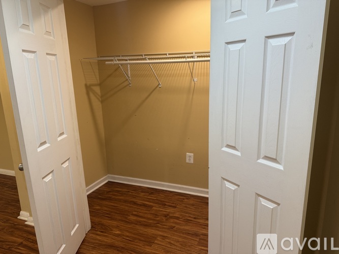 A white door is on the left and a white door is on the right.