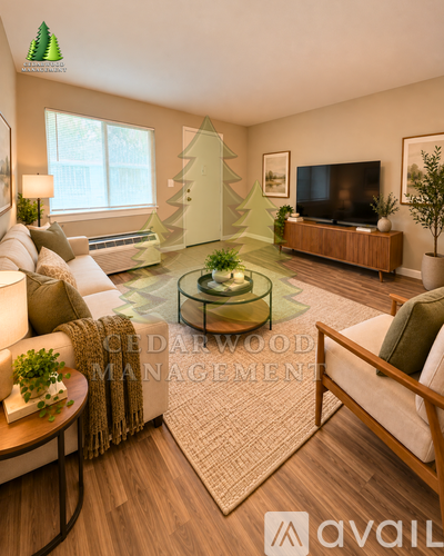 A living room with a glass coffee table in the middle.