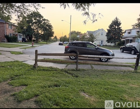 A car is parked on the side of a street.