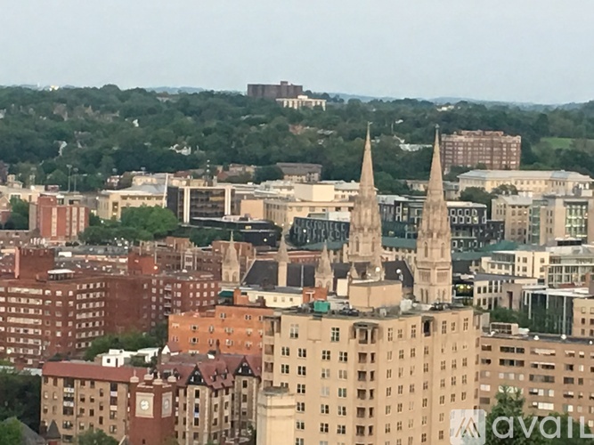A cityscape with a large church in the center.