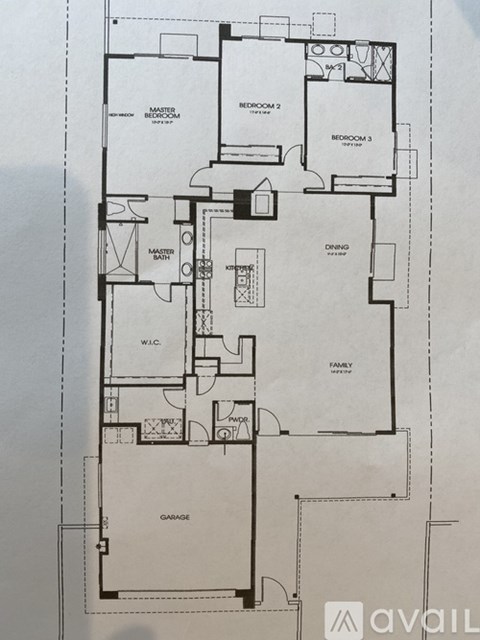 A floor plan of a house with three bedrooms, a garage, and a master bath.