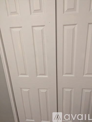 A white door with a panel design.