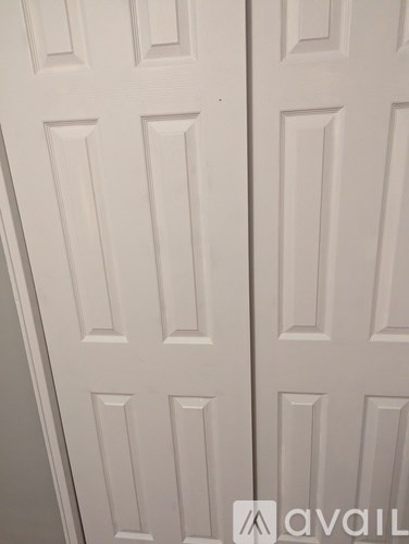 A white door with a panel design.