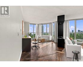 A modern living room with a view of the city.
