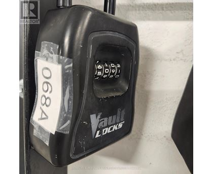 A black Vault Locks keypad is labeled with the number 0684.