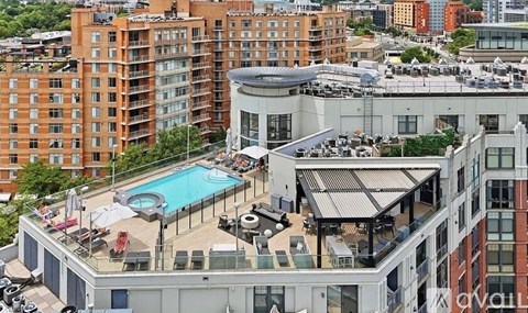 A large building with a pool in the middle of it.