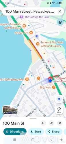 A map application is open, showing a street view of 100 Main Street in Pewaukee.